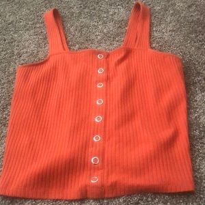 A orange crop top